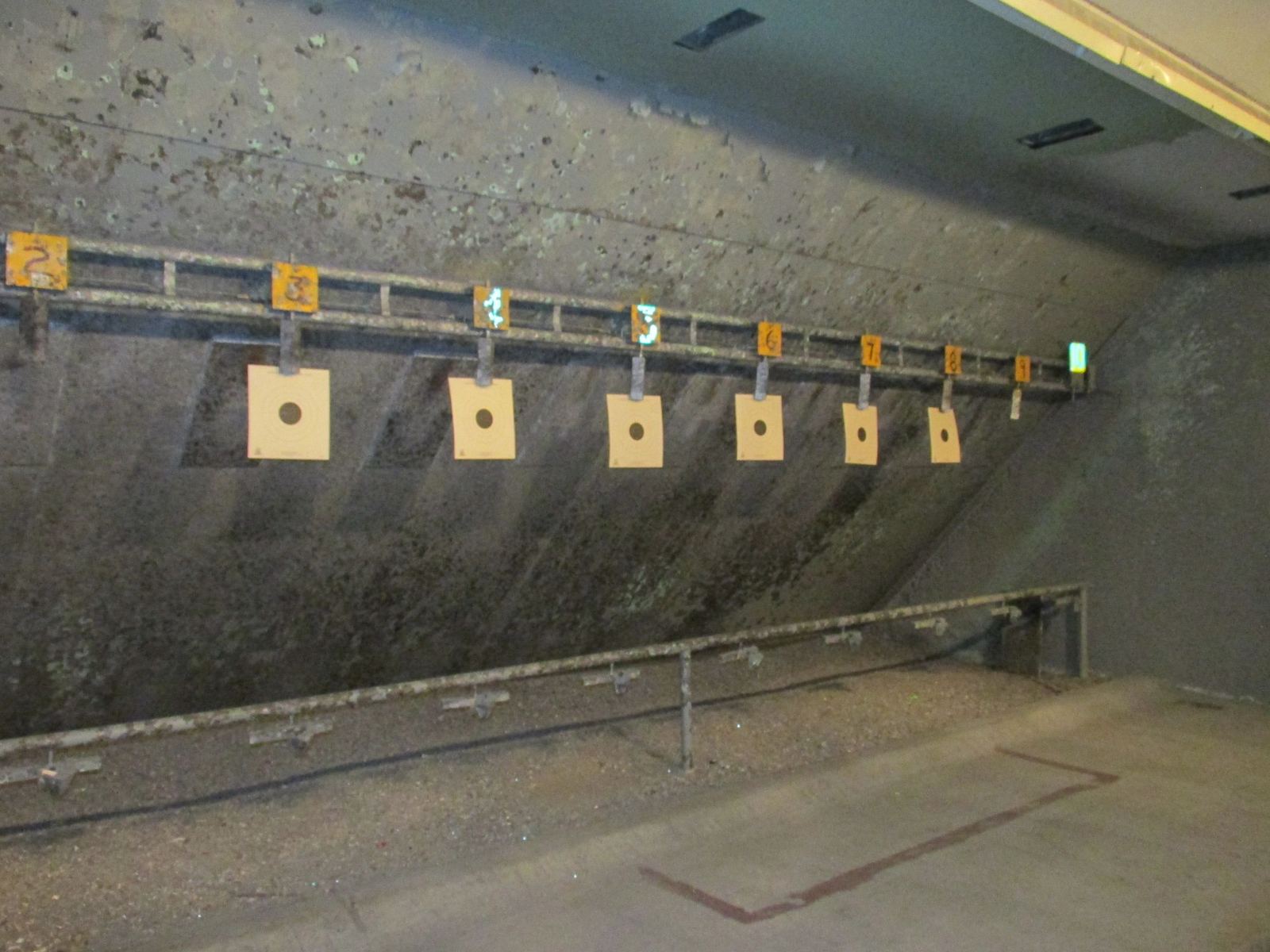 Indoor pistol range lanes and targets